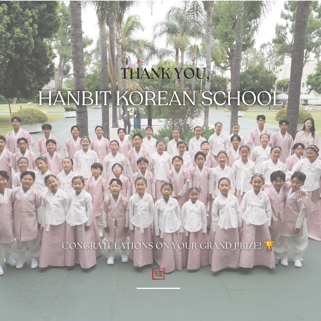 Group of students at Hanbit Korean School wearing traditional Korean hanbok.