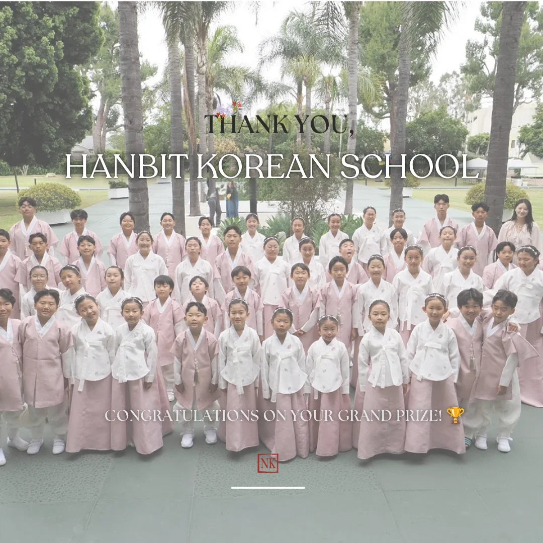 Group of students at Hanbit Korean School wearing traditional Korean hanbok.