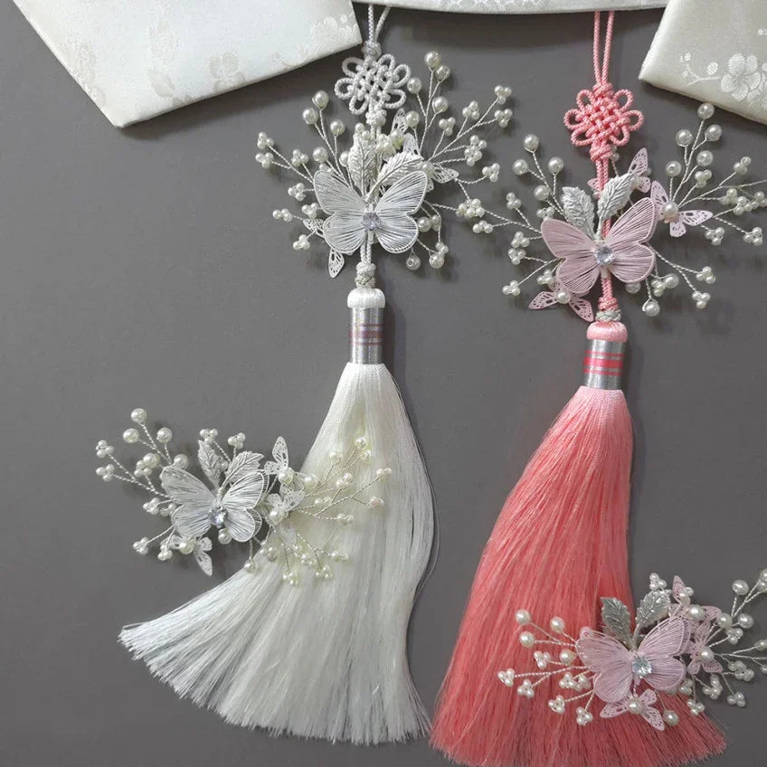 Sana Butterfly Norigae hair accessories in white and pink with pearl and butterfly details