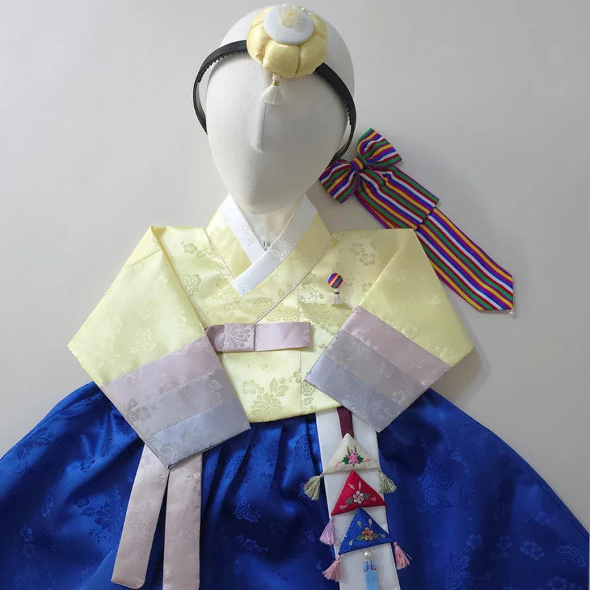 Native Korean Girl Hanbok in yellow and blue with a Bokgun and Daenggi