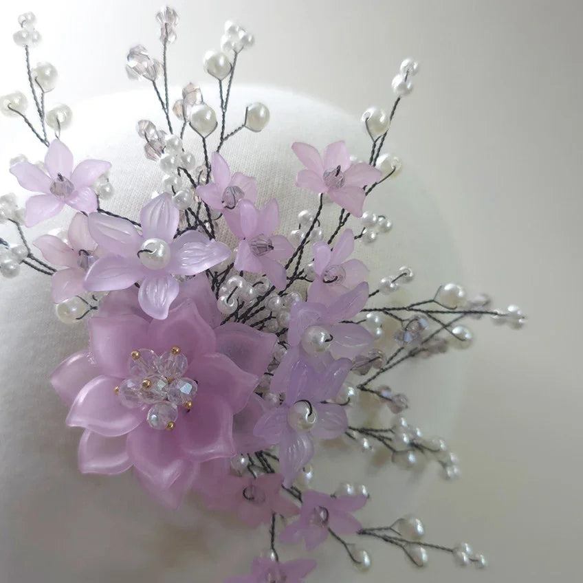 Close-up of Native Korean Spring Blossom Hanbok hairpin with purple flowers and pearl accents.