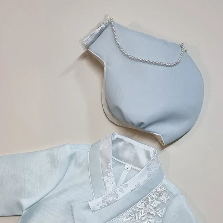 Sky blue Native Korean Jobawi and matching hanbok top with white embroidery.