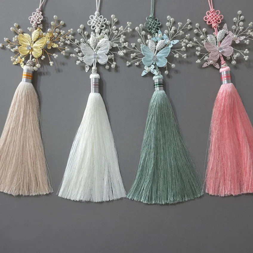 Four Sana Butterfly Tassel Norigae by Native Korean in yellow, white, green, and pink colors.