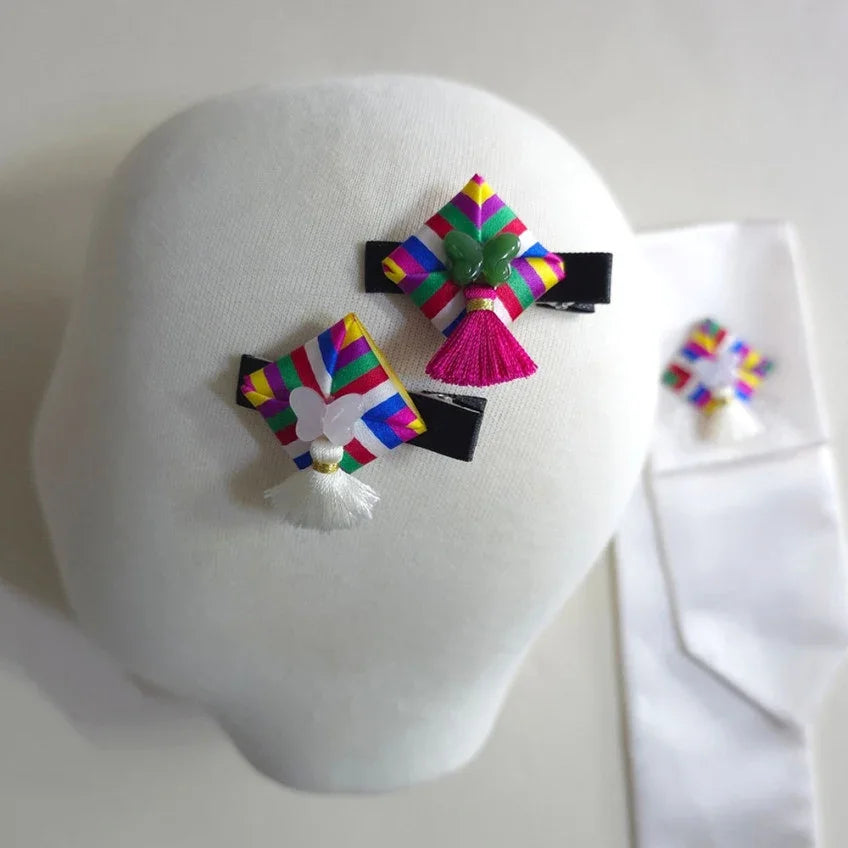 Native Korean Saekdong Ddakji hairpins on a white mannequin head