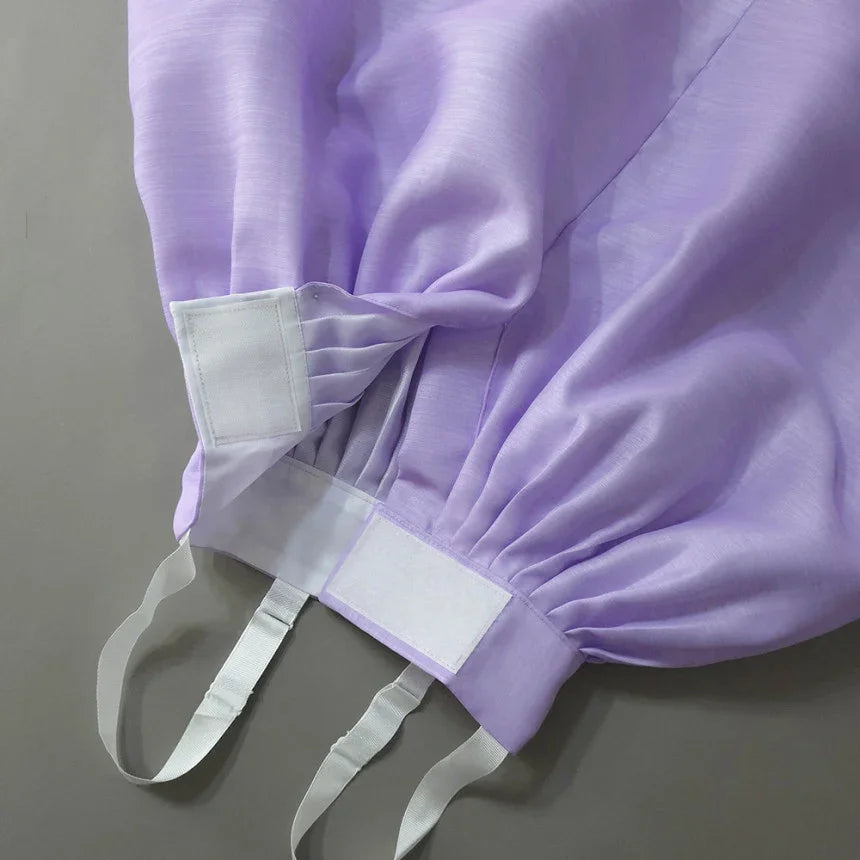 Close-up of the adjustable waistband and ties of a purple Girl Hanbok by Native Korean.