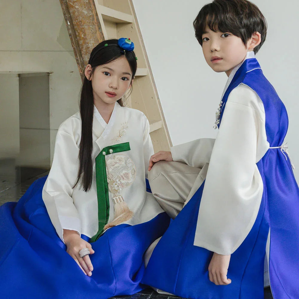 Two children wearing Native Korean traditional hanbok, including a girl hanbok with norigae.