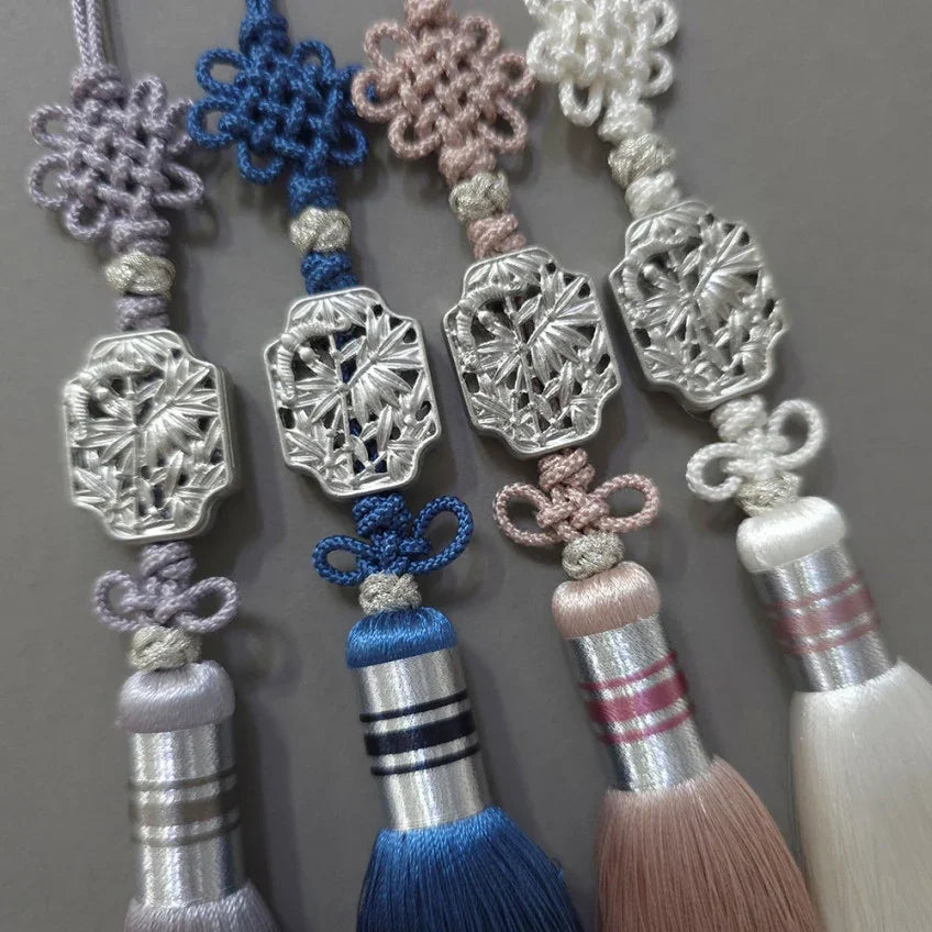 Four Silver Bamboo Tassel Norigae by Native Korean in purple, blue, pink, and white.
