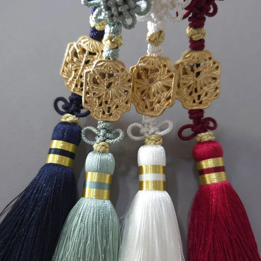 Four Native Korean Gold Bamboo Tassel Norigae in navy, mint, white, and red.