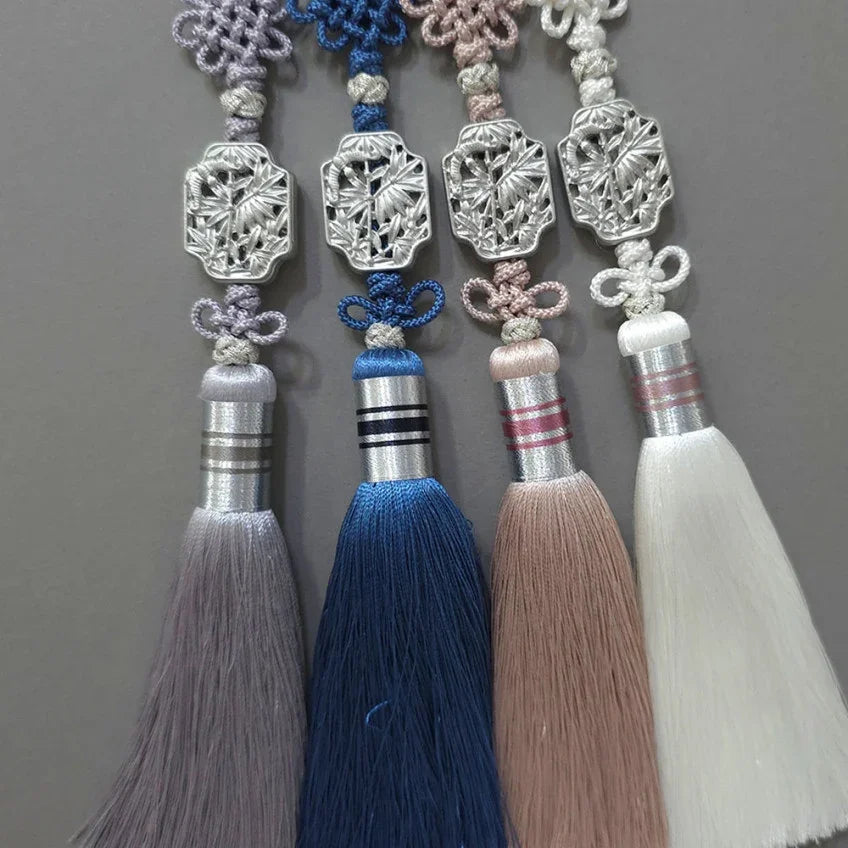 Four Native Korean Silver Bamboo Tassel Norigae in purple, blue, pink, and white.