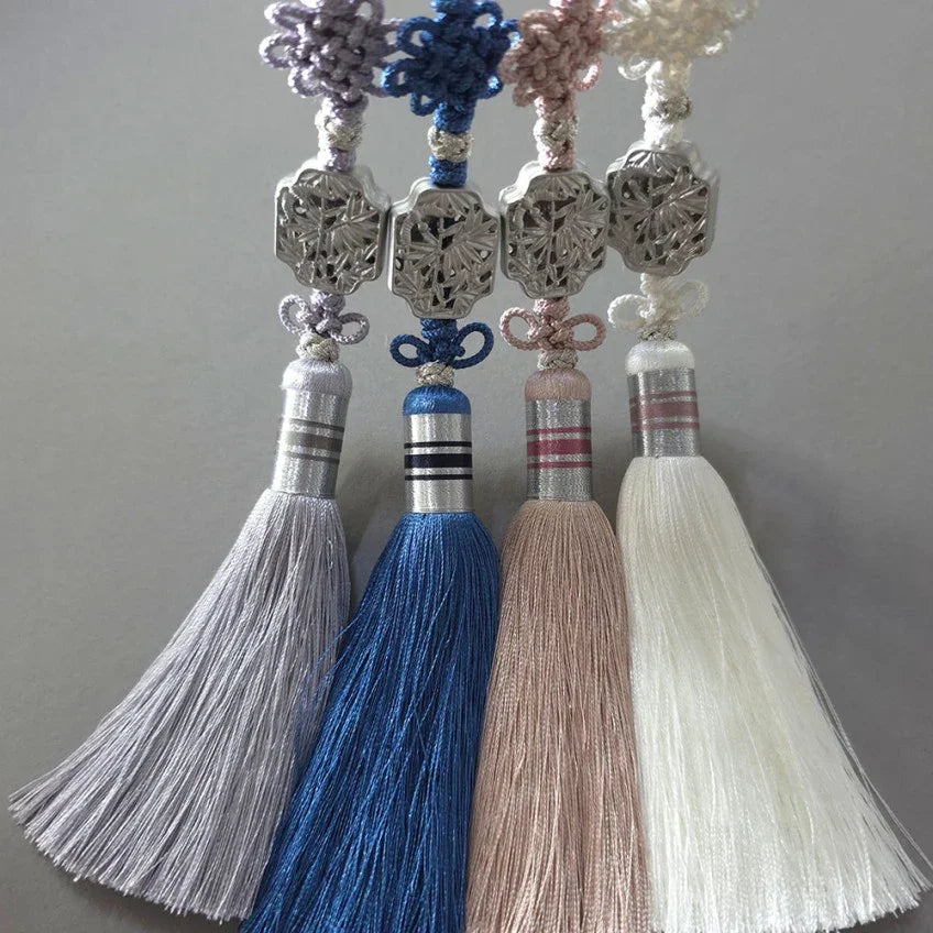 Four Native Korean Silver Bamboo Tassel Norigae in purple, blue, pink, and white.