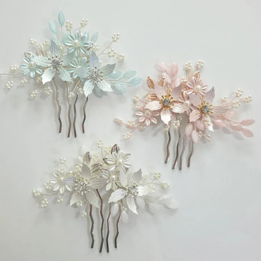 Three Petal Bloom Hanbok hair combs by Native Korean in light blue, pink, and white.