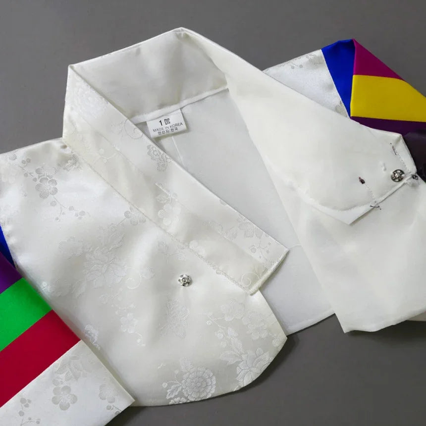 Close-up of the collar and fabric details of a white Native Korean Girl Hanbok Jeogori.