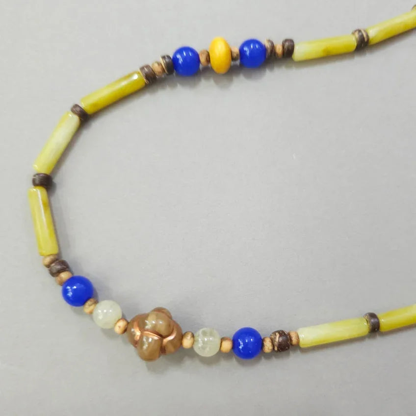 Yellow and blue natural stone beads on a Native Korean Gat string
