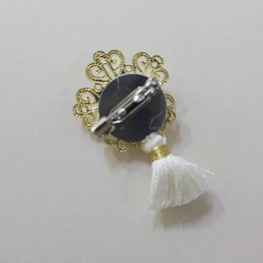 Back view of Native Korean Bloom Tassel Brooch showing gold filigree and white tassel