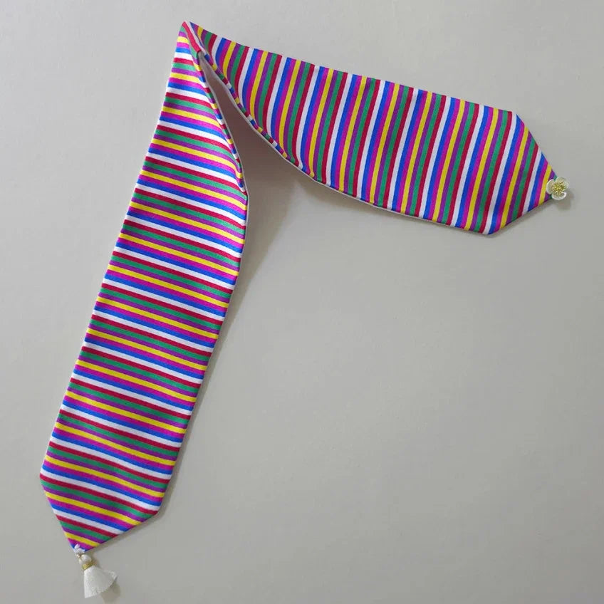 Native Korean Saekdong Daenggi hair tie with colorful stripes and white tassel