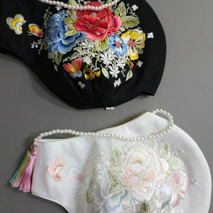 Black and white floral embroidered Jobawi from Native Korean with pearl straps.