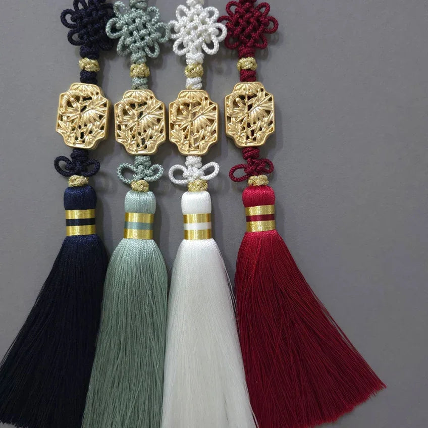 Four Native Korean Gold Bamboo Tassel Norigae in navy, sage green, white, and red.