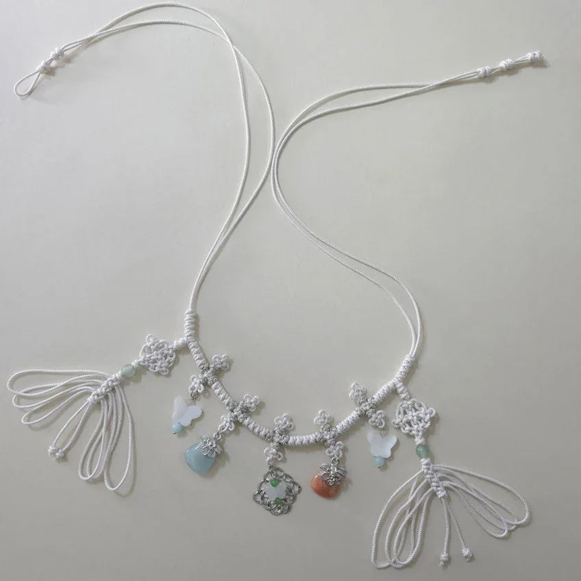 White Native Korean Charm Knotted Dol Belt with traditional Norigae ornaments
