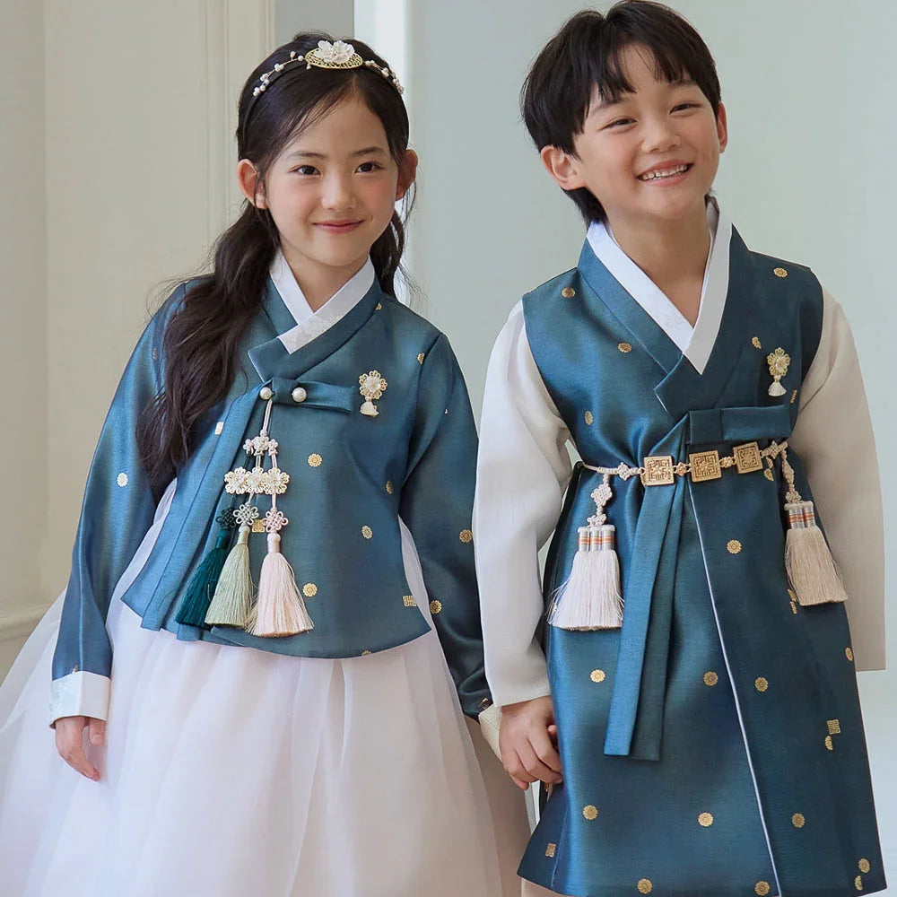 A boy and girl wearing teal Native Korean hanbok with traditional norigae accessories.