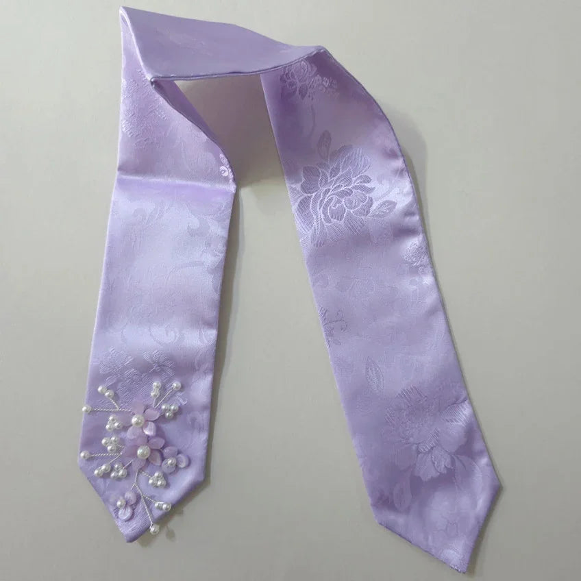 Lavender Native Korean daenggi with floral patterns and pearl bead embellishments