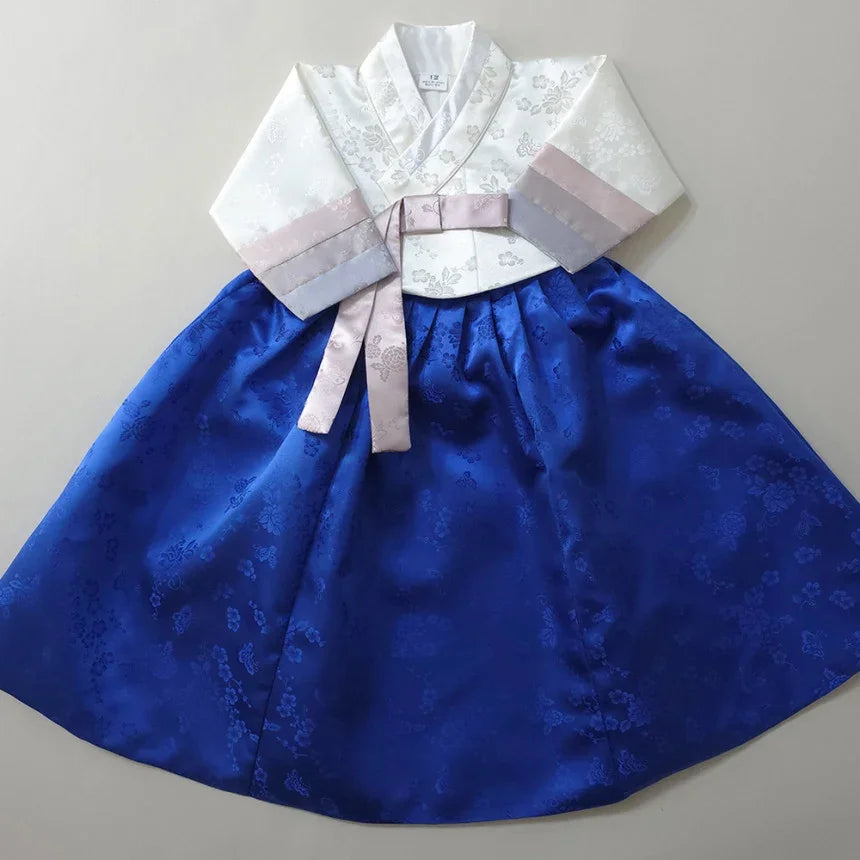 Yunjae Sky Blue Girl Hanbok by Native Korean featuring a white jeogori and royal blue chima.