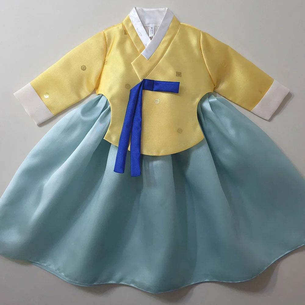 Native Korean Ian Yellow Sky Girl Hanbok featuring a yellow jeogori and sky blue chima.