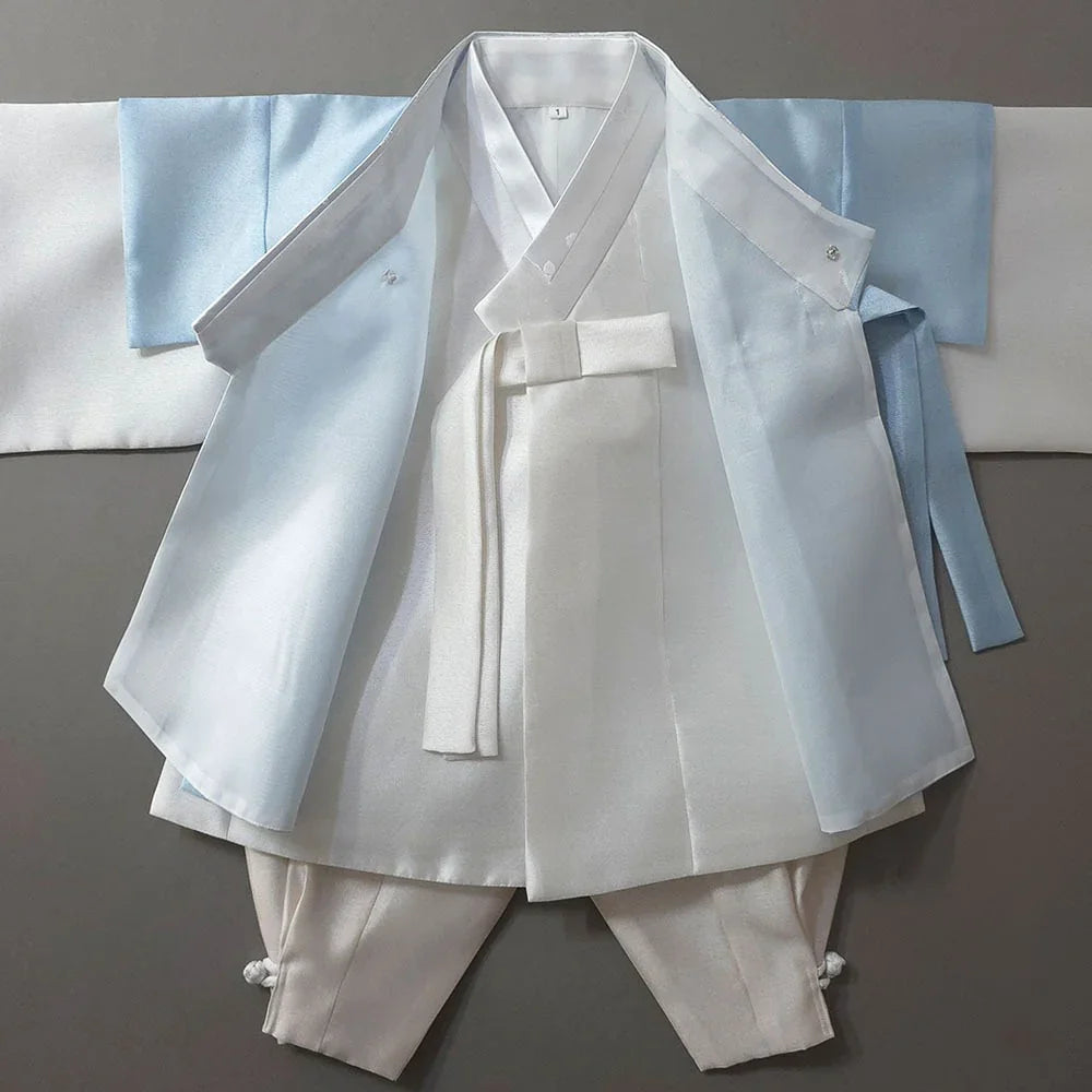 Native Korean Gunyun Sky Dopo Boy Hanbok featuring a white robe and light blue overcoat.