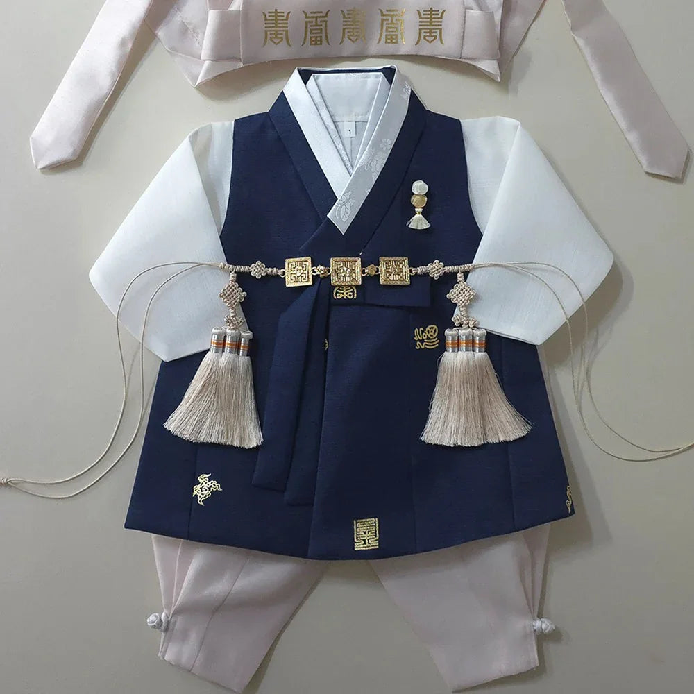 Yoon Navy Boy Hanbok by Native Korean with gold accents and Norigae tassels.