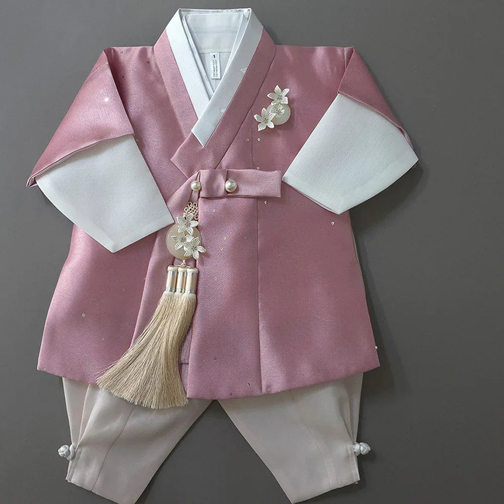 Pearl pink Boy Hanbok by Native Korean with white sleeves and a decorative Norigae tassel.