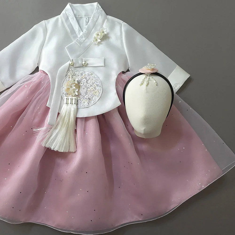 Pearl pink girl hanbok by Native Korean with matching jokduri and norigae