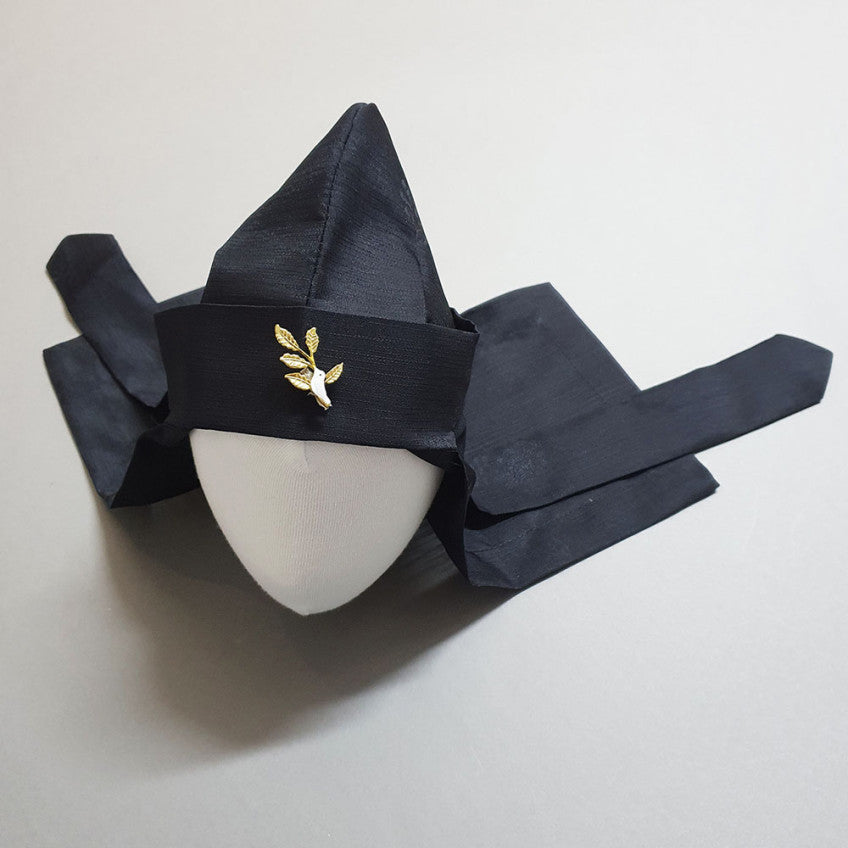 Gold Bird Bokgeon traditional Korean boy hanbok hat featuring a gold bird ornament and adjustable ribbon ties for Dol, Baek-il, and Korean celebrations.