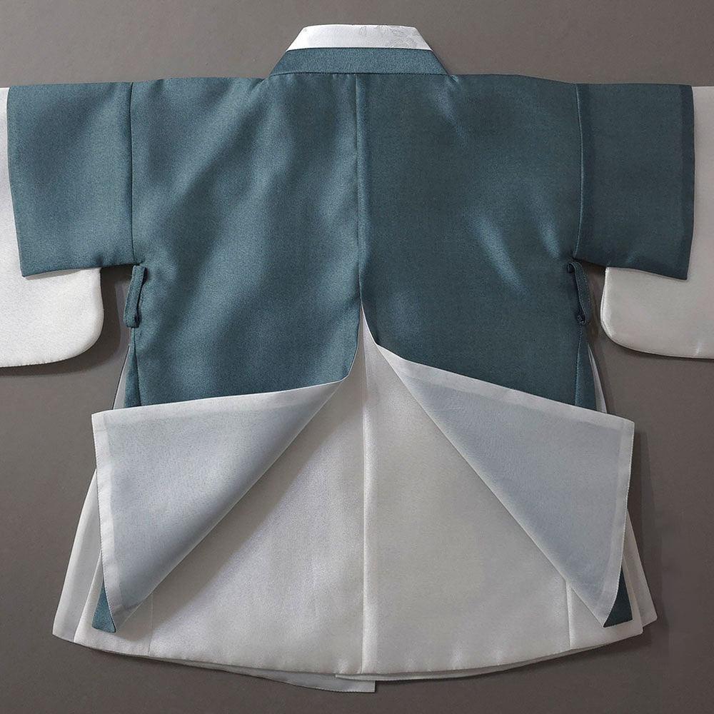Back view of a teal Gunyun Dopo Boy Hanbok by Native Korean with a white lining.