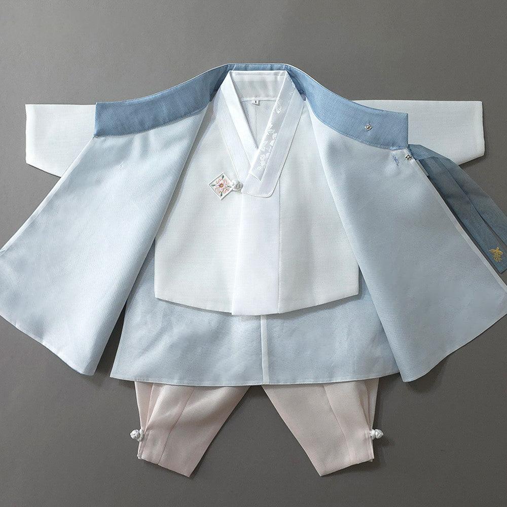 Heesung Sky Boy Hanbok by Native Korean featuring a light blue and white traditional ensemble.