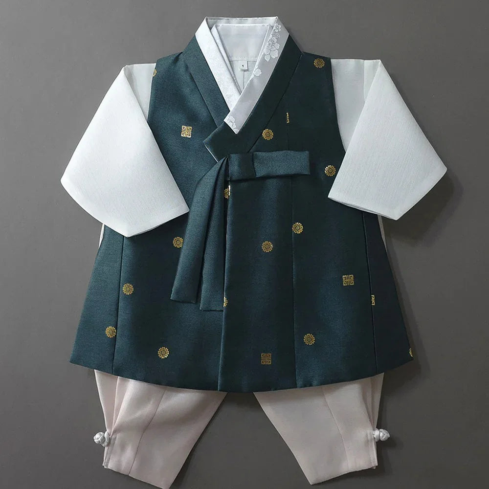 Dowon Teal Boy Hanbok by Native Korean featuring a decorated vest and white sleeves.