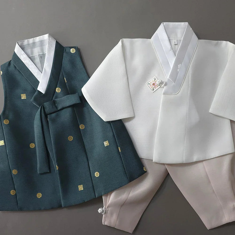 Native Korean Dowon teal and white Boy Hanbok set with traditional gold embroidery.