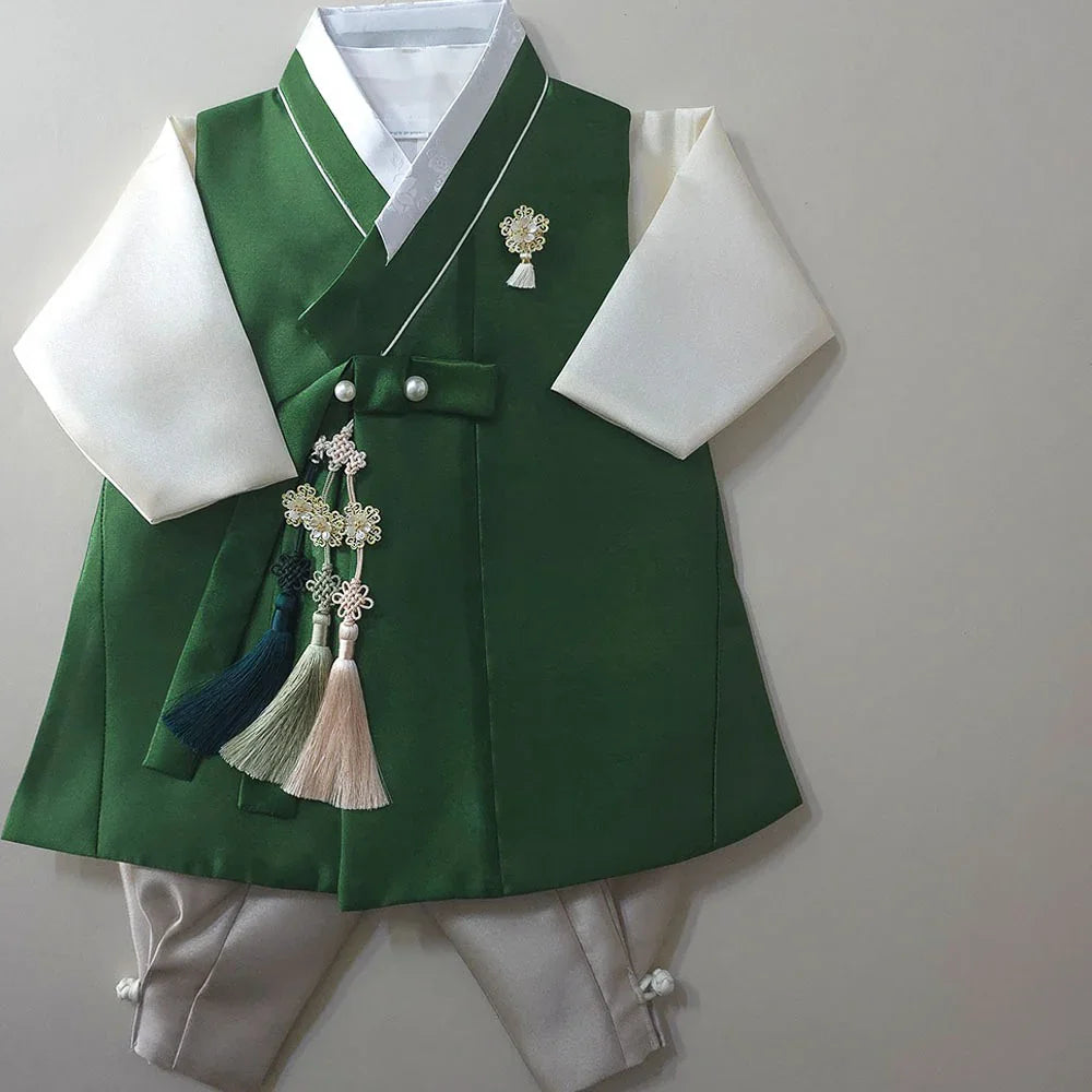 Green and white Boy Hanbok by Native Korean with traditional Norigae tassels.