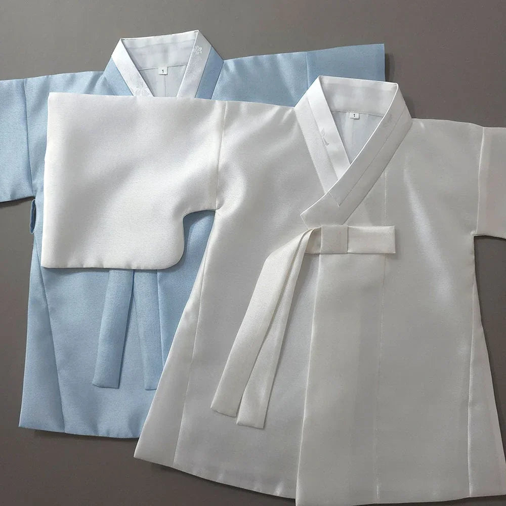 White and light blue Native Korean Boy Hanbok Dopo sets.