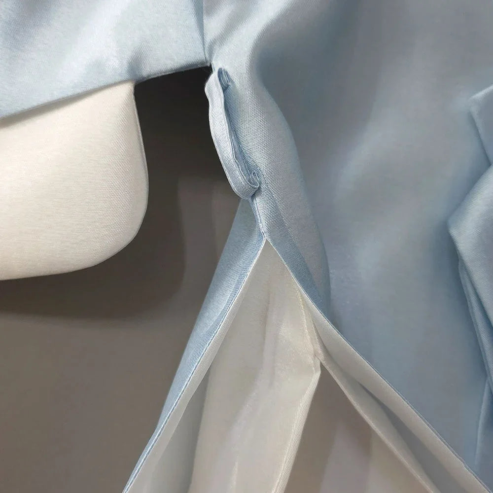 Close-up detail of the light blue fabric and stitching of a Native Korean Boy Hanbok Dopo.