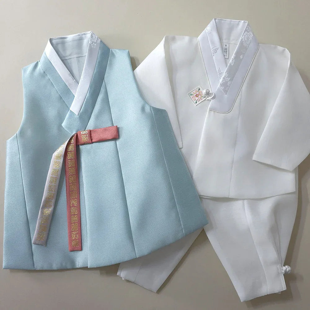 A light blue Eunkyo Sky Vest and white Boy Hanbok by Native Korean.
