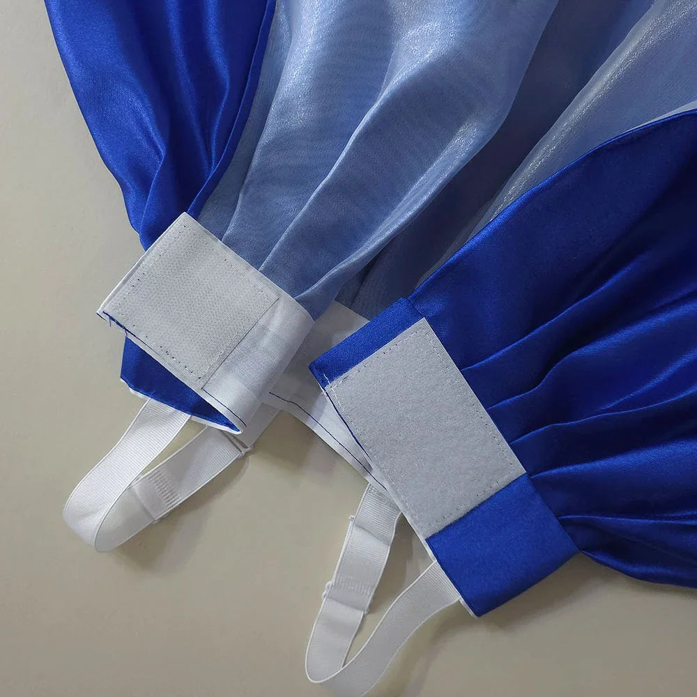 Close-up of the blue and light blue fabric and adjustable straps of a Native Korean Girl Hanbok.