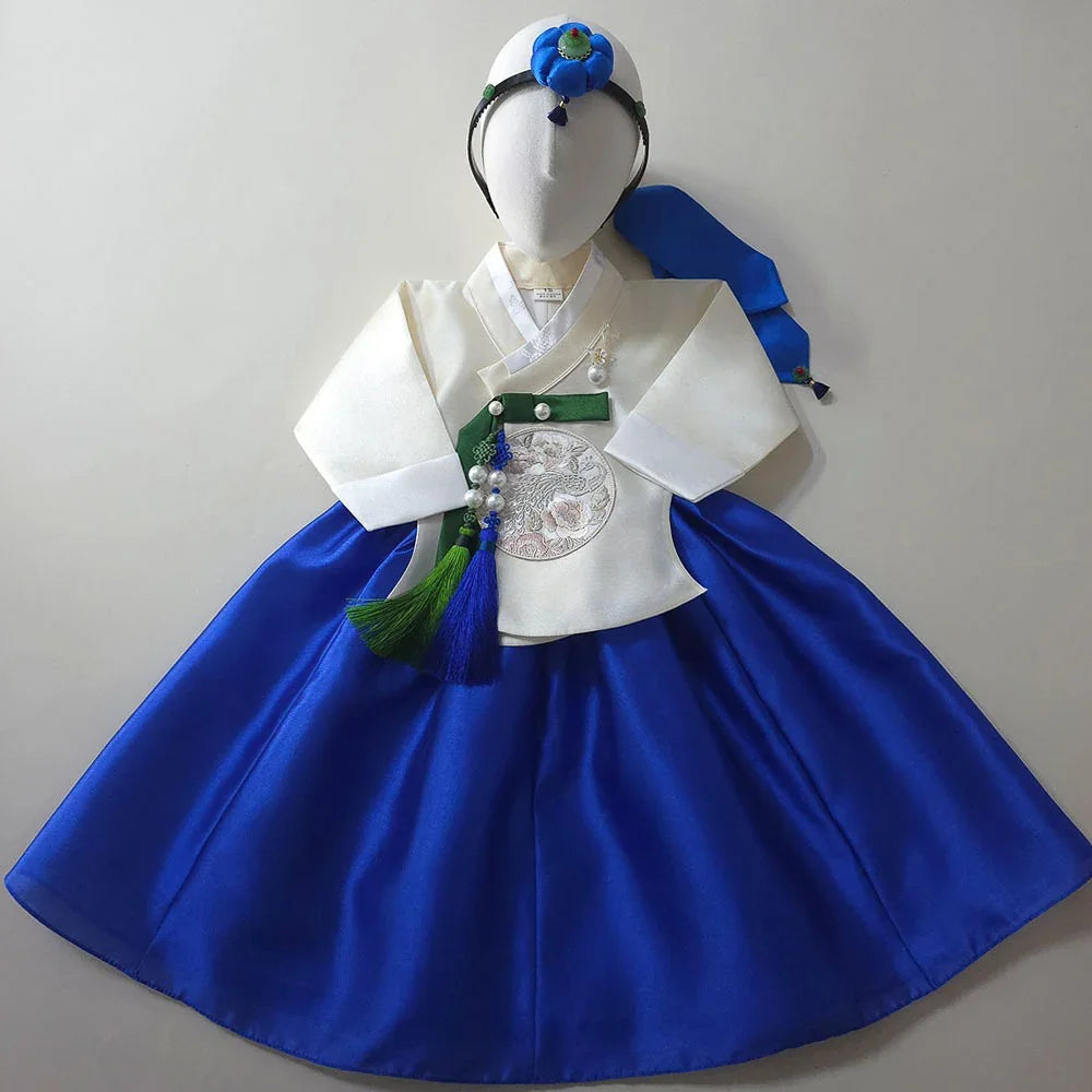 Yoonseo Blue Girl Hanbok by Native Korean with a matching Daenggi and Norigae accessory.